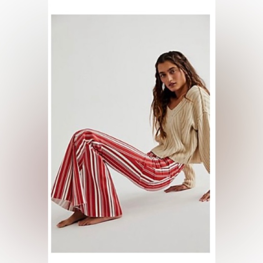 NWT Free People Just Float On Printed Flare Jeans in DK Red size 32